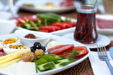 Rich and delicious Turkish breakfast on white wood table