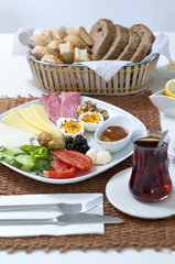 Rich and delicious Turkish breakfast on white wood table