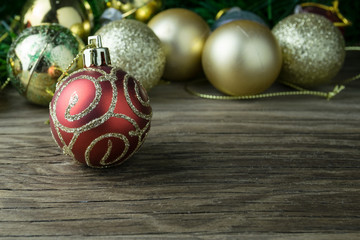christmas balls on old wooden background for decoration