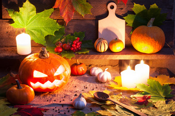 Halloween pumpkins on wooden table background