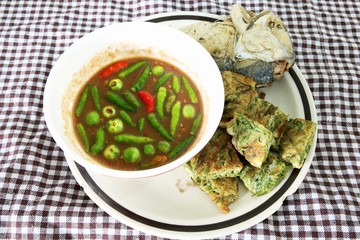Thai cuisine-Nam Prik Gapi or spicy shrimp paste and fried mackerel fish  
