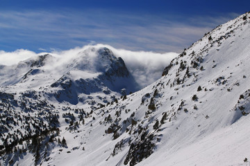 Fog on the mountain slope in Andorra