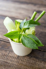 close up vegetable food and cup on wood table