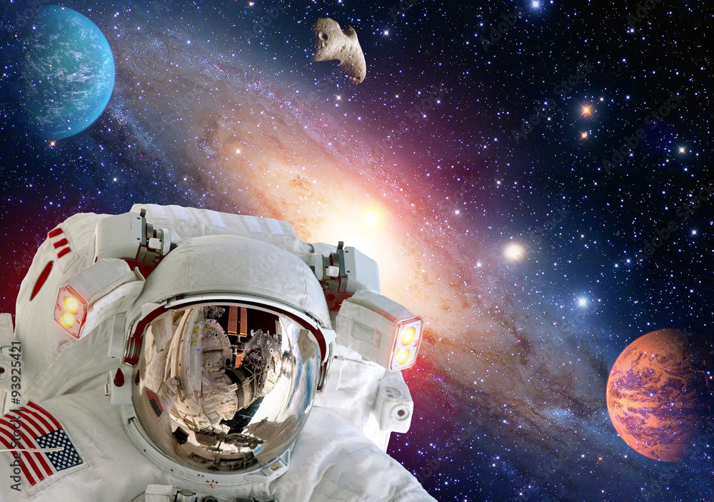 Wall mural astronaut spaceman helmet outer space suit solar system planet. elements of this image furnished by 