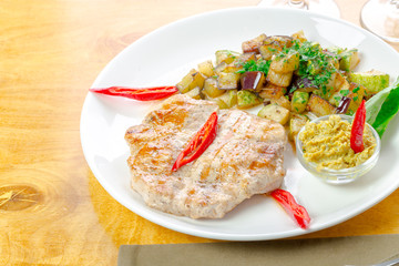 Grilled chicken fillet with grilled eggplant salad