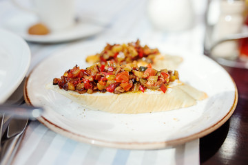 Bruschette, traditional italian appetizer food with tomato and e
