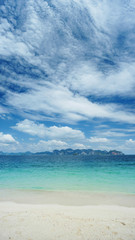 The sand and sea on blue sky and cloud in sunshine