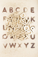 Gold English alphabet on a gold background