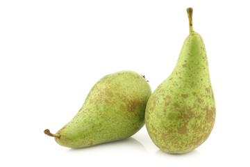 two fresh conference pears on a white background