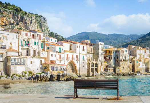 Cefalu beachfront with old building, Sicily, Italy