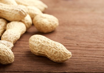 peanuts on wooden background