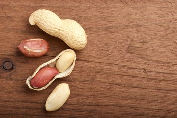 peanuts on wooden background