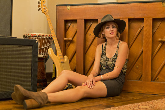 Portrait of woman relaxing on floor