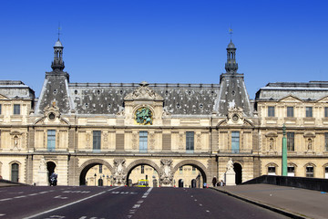 Fototapeta na wymiar Louvre Museum in Paris with a retro effect..