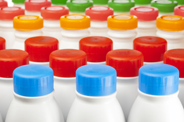 dairy products bottles with bright covers