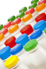 dairy products bottles with bright covers