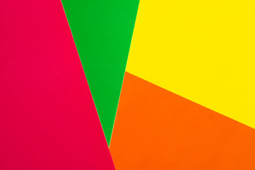 Colorful background from sheets of paper different colors