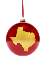 Red bauble with the golden shape of Texas.(series)