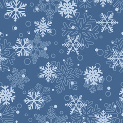 Seamless pattern of snowflakes, light blue on blue