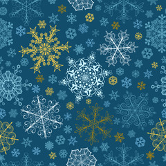 Seamless pattern of snowflakes, multicolored on blue