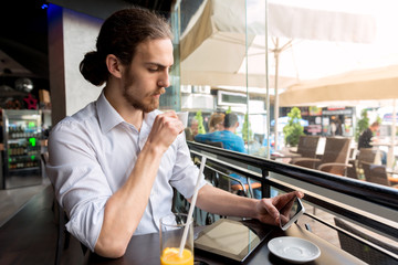 Man holding mobile phone