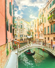 Fototapeta na wymiar Canal in Venice at sunny day. Italy. Europe. Toned image.