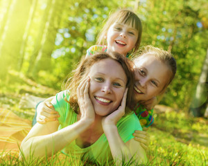 Beautiful mother and her daughters.