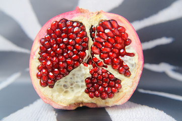 Half a large red pomegranate