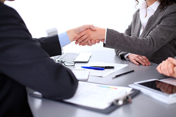 Business people shaking hands, finishing up a meeting, copy spase area
