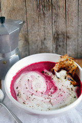 Beet or beetroot creamy soup like borscht with cappuccino