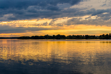 Fototapeta premium Sunset with dramatic sky over Nove Mlyny lake, Mikulov, Czech Republic