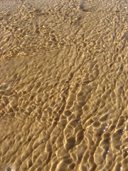 Fototapeta na wymiar close-up sea beautiful clear beach ripple water