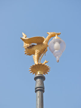 Thai art style light pole under blue sky