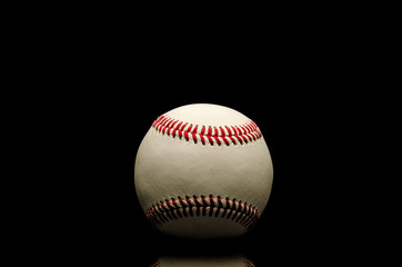 Solo baseball on black