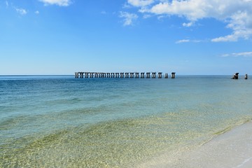 
An abandoned pier, with crystal clear water, Gasparilla Island beach, Boca Grande, Florida.