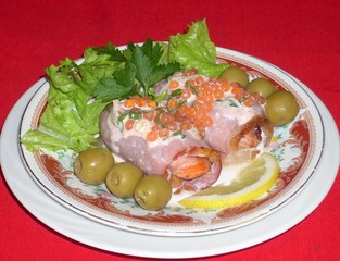 Ham rolls with smoked salmon and caviar