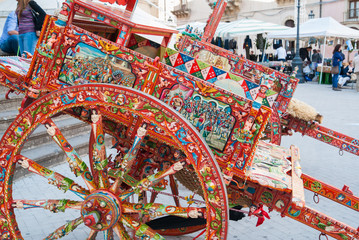 View of a typical colorful sicilian cart with its characteristic decorations