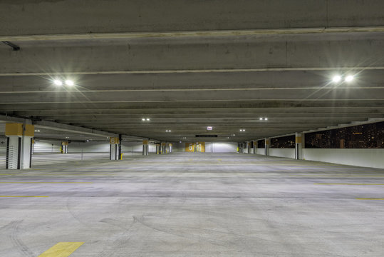 Empty parking garage at night