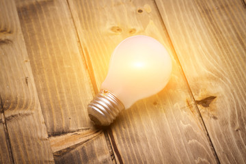 Led Light Bulb On The Wood