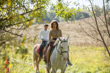 Young couple riding