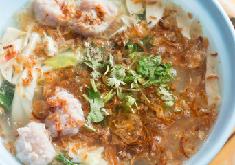 Brewed bean curd noodle or yong tau foo on a distinctively white noodle dish in Thailand