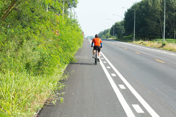 Close up front of new car parking on the asphalt road