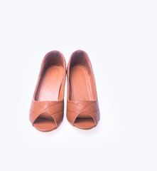 shoe. Brown colour fashion woman shoes on a background.
