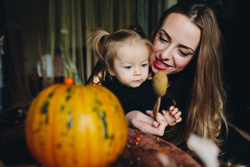 Fototapeta premium mother and daughter playing together at home