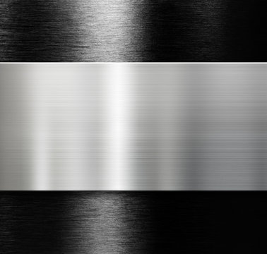 metal plate over black brushed aluminum background