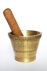 Brass mortar and pestle isolated