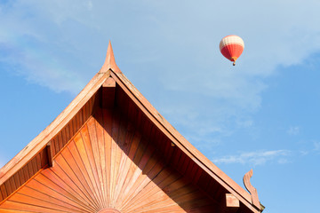 Fototapeta na wymiar Loas style roof for house with balloon 
