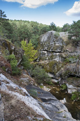 Fototapeta na wymiar Views of the river Eresma on its course through Boca del Asno, Segovia Province, Spain, a recreational area in Guadarrama Mountains