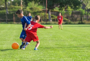 Foto op Plexiglas kids soccer © Dusan Kostic