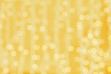 blurred golden background with bokeh lights